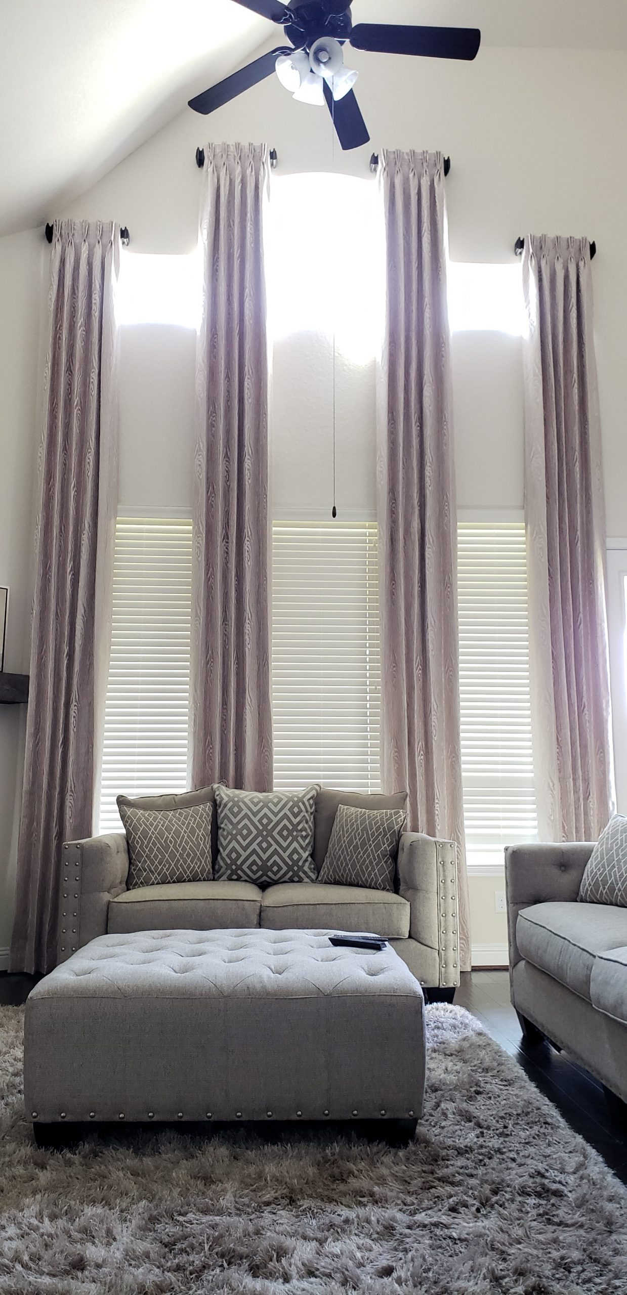 Board mounted multi-level pinch pleated panels with accent finials