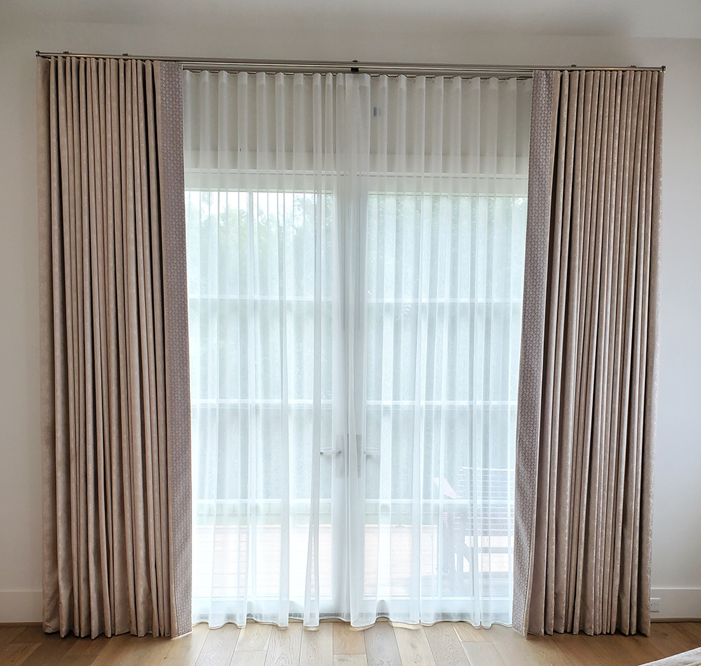 Ripplefold sheer draperies with Ripplefold banded over draperies mounted on decorative track rods_1000x950